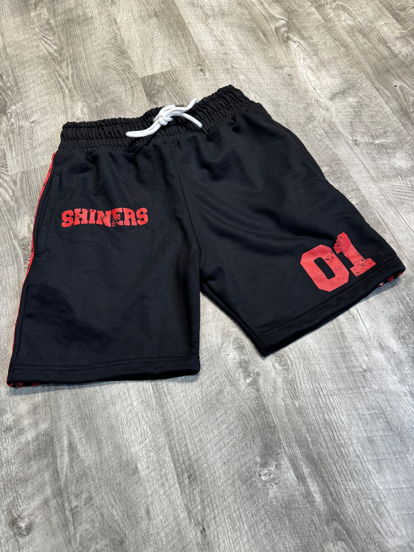 01 Uniform “Bred” Shorts